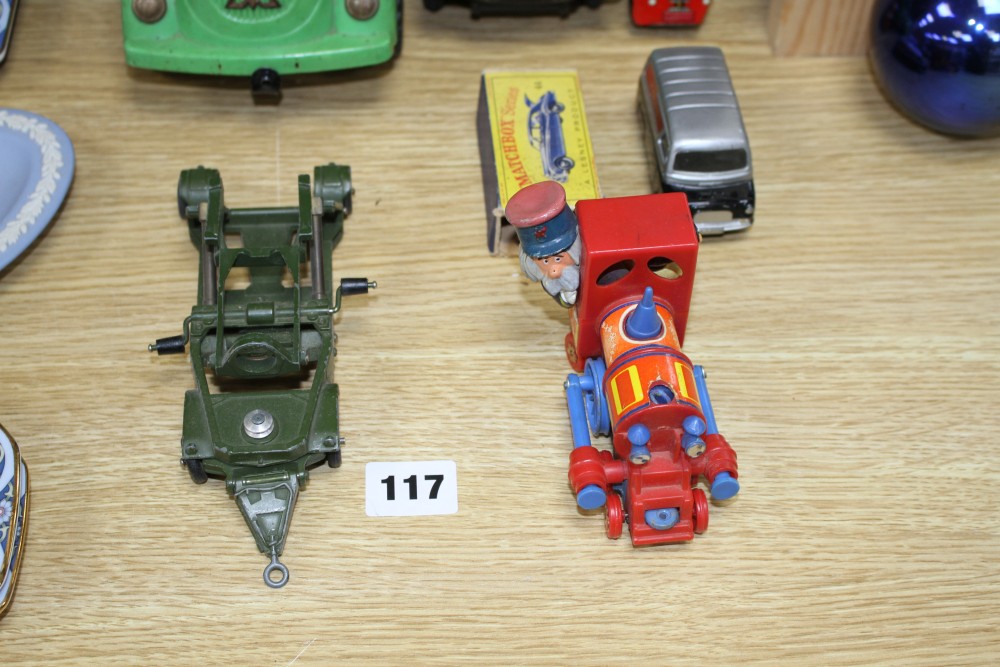 A group of assorted tinplate and diecast toys